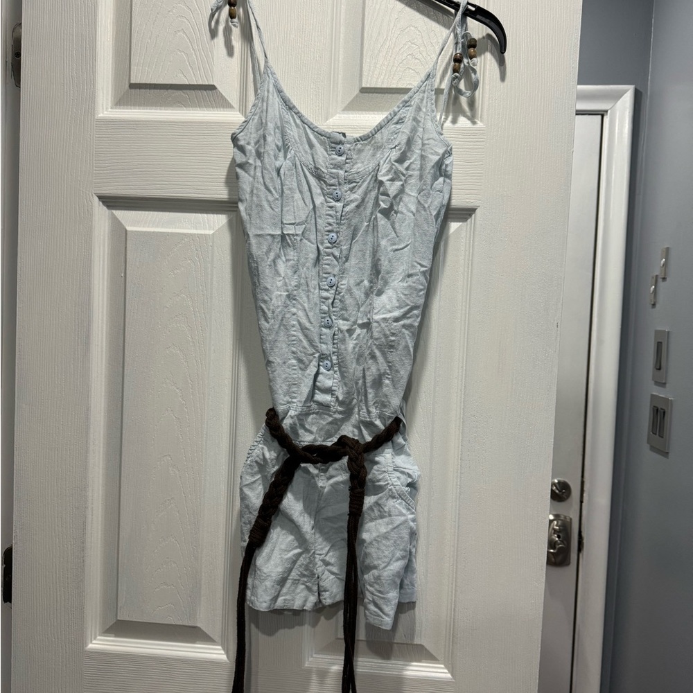 Light blue romper with braided brown tie